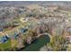 Aerial view of neighborhood with lake and pool at 225 South Shore Dr, Belmont, NC 28012