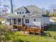 Home exterior showcasing deck and screened porch at 225 South Shore Dr, Belmont, NC 28012