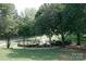 Scenic park with fountain and walking paths at 225 South Shore Dr, Belmont, NC 28012