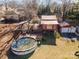 Aerial view of a property with a pool, deck, and a garage at 2407 Brookside Ave, Kannapolis, NC 28081