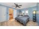 Bedroom with a glimpse of an attached bathroom, great natural light, and wood floors at 2407 Brookside Ave, Kannapolis, NC 28081