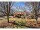 Inviting home featuring a cozy front porch with seating and a well-maintained yard at 2407 Brookside Ave, Kannapolis, NC 28081