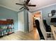 Bright room featuring hardwood floors, neutral walls, and dual desk setup at 2407 Brookside Ave, Kannapolis, NC 28081