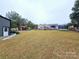 Large backyard with shed and playset at 249 Planters Row Rd, Iron Station, NC 28080