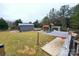 Large backyard with playset, sandbox, and shed at 249 Planters Row Rd, Iron Station, NC 28080