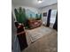 Charming bedroom with a mountain mural and a crib at 249 Planters Row Rd, Iron Station, NC 28080