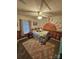 Cozy bedroom featuring a sunset mural and a comfortable bed at 249 Planters Row Rd, Iron Station, NC 28080