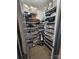 Well-organized walk-in closet with ample shelving and drawers at 249 Planters Row Rd, Iron Station, NC 28080