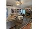 Living room featuring a stone fireplace and farmhouse decor at 249 Planters Row Rd, Iron Station, NC 28080