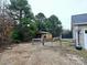 Wooden storage shed with fenced area at 249 Planters Row Rd, Iron Station, NC 28080