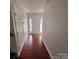 Hardwood floors and neutral walls in the entryway at 2509 Calgary Pl, Concord, NC 28027