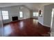 Spacious living room with hardwood floors and fireplace at 2509 Calgary Pl, Concord, NC 28027