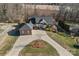 Luxury home with circular driveway and detached garage; spacious lot at 2635 Queens Dr, Lincolnton, NC 28092