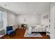 Basement bedroom with a white bed frame and blue chair at 2635 Queens Dr, Lincolnton, NC 28092