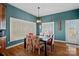 Charming dining room with hardwood floors and a view of the backyard at 2635 Queens Dr, Lincolnton, NC 28092