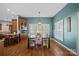 Light and airy dining room with hardwood floors and access to the outdoors at 2635 Queens Dr, Lincolnton, NC 28092