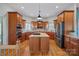 Spacious kitchen with island and stainless steel appliances at 2635 Queens Dr, Lincolnton, NC 28092