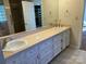 Bathroom with double vanity and tiled floors at 273 Leeward Point Loop, Taylorsville, NC 28681