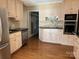 Kitchen with stainless steel appliances and wood floors at 273 Leeward Point Loop, Taylorsville, NC 28681