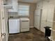 Laundry room with washer, dryer, and ample storage at 273 Leeward Point Loop, Taylorsville, NC 28681