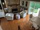 Living room features stone fireplace and hardwood floors at 273 Leeward Point Loop, Taylorsville, NC 28681