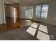 Spacious living room with hardwood floors and sunlight at 273 Leeward Point Loop, Taylorsville, NC 28681