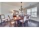 Elegant dining room with hardwood floors, chandelier, and large table at 273 Sweet Briar Dr, Fort Mill, SC 29707