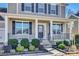 Two-story home with gray siding, black shutters, and a front porch at 273 Sweet Briar Dr, Fort Mill, SC 29707