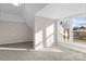 Bedroom with carpet and large window overlooking street at 336 3Rd Se St, Hickory, NC 28602