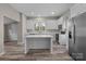 Modern kitchen with white cabinets and an island at 336 3Rd Se St, Hickory, NC 28602