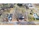 Aerial view showcasing the property lines and surrounding greenery at 34 Lee Rd, Stony Point, NC 28678