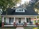 Charming single Gathering home with a covered front porch and classic architectural details at 34 Lee Rd, Stony Point, NC 28678