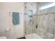 Modern bathroom with walk-in shower and stylish tile at 3936 Rothwood Ln, Harrisburg, NC 28075