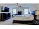 Spacious bedroom with dark wood sleigh bed and dresser at 3936 Rothwood Ln, Harrisburg, NC 28075