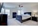 Spacious bedroom with dark wood sleigh bed and dresser at 3936 Rothwood Ln, Harrisburg, NC 28075