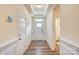 Bright and spacious entryway with a view of the hallway at 3936 Rothwood Ln, Harrisburg, NC 28075