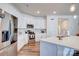 Modern kitchen with white cabinets, stainless steel appliances, and an island at 3936 Rothwood Ln, Harrisburg, NC 28075