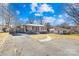 Ranch style home with brick facade and landscaped yard at 404 Ford St, Kannapolis, NC 28083