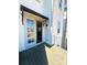 Second floor balcony showcasing wood deck, French doors and metal railing at 425 Delburg Mill Alley Dr, Davidson, NC 28036