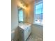 Bathroom featuring a white vanity with chrome fixtures, and a mirror at 425 Delburg Mill Alley Dr, Davidson, NC 28036