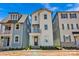 Beautiful two-story home featuring a welcoming front porch and a charming second-floor balcony at 425 Delburg Mill Alley Dr, Davidson, NC 28036