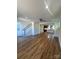 Open-concept living room showcasing hardwood floors, recessed lighting, and staircase at 425 Delburg Mill Alley Dr, Davidson, NC 28036
