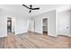 Spacious bedroom with a ceiling fan, closet, and an ensuite bathroom with modern finishes at 429 Delburg Mill Alley Dr, Davidson, NC 28036