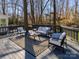 Modern deck with stylish furniture and wooded views at 4342 Arborway None, Charlotte, NC 28211