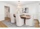 Elegant dining room with wood table, chandelier, and neutral decor at 4342 Arborway None, Charlotte, NC 28211