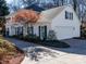 White house with blue shutters, attached garage, and manicured landscaping at 4342 Arborway None, Charlotte, NC 28211