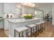 Modern kitchen with white cabinets, marble countertops, and large island at 4342 Arborway None, Charlotte, NC 28211