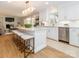 Modern kitchen with white cabinets, marble countertops, and large island at 4342 Arborway None, Charlotte, NC 28211