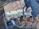 Aerial view of house, deck, and backyard with stone patio at 4440 Beechaven Dr, Rock Hill, SC 29732