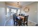 Charming breakfast nook with a rustic wooden table and window seating at 4440 Beechaven Dr, Rock Hill, SC 29732